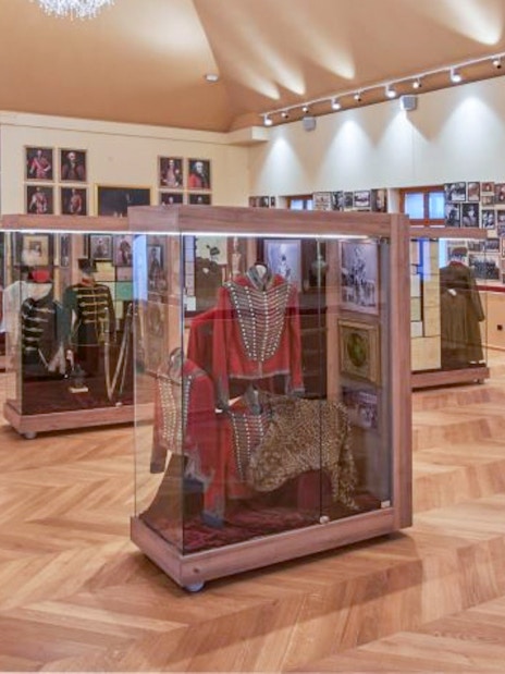Hungarian Royal Guard uniforms on display at Riding Hall exhibition in Budapest.