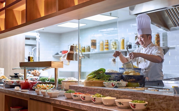 Chef preparing noodles at Plaza Premium Lounge, next to Aerotel Kuala Lumpur, gateway@klia2.