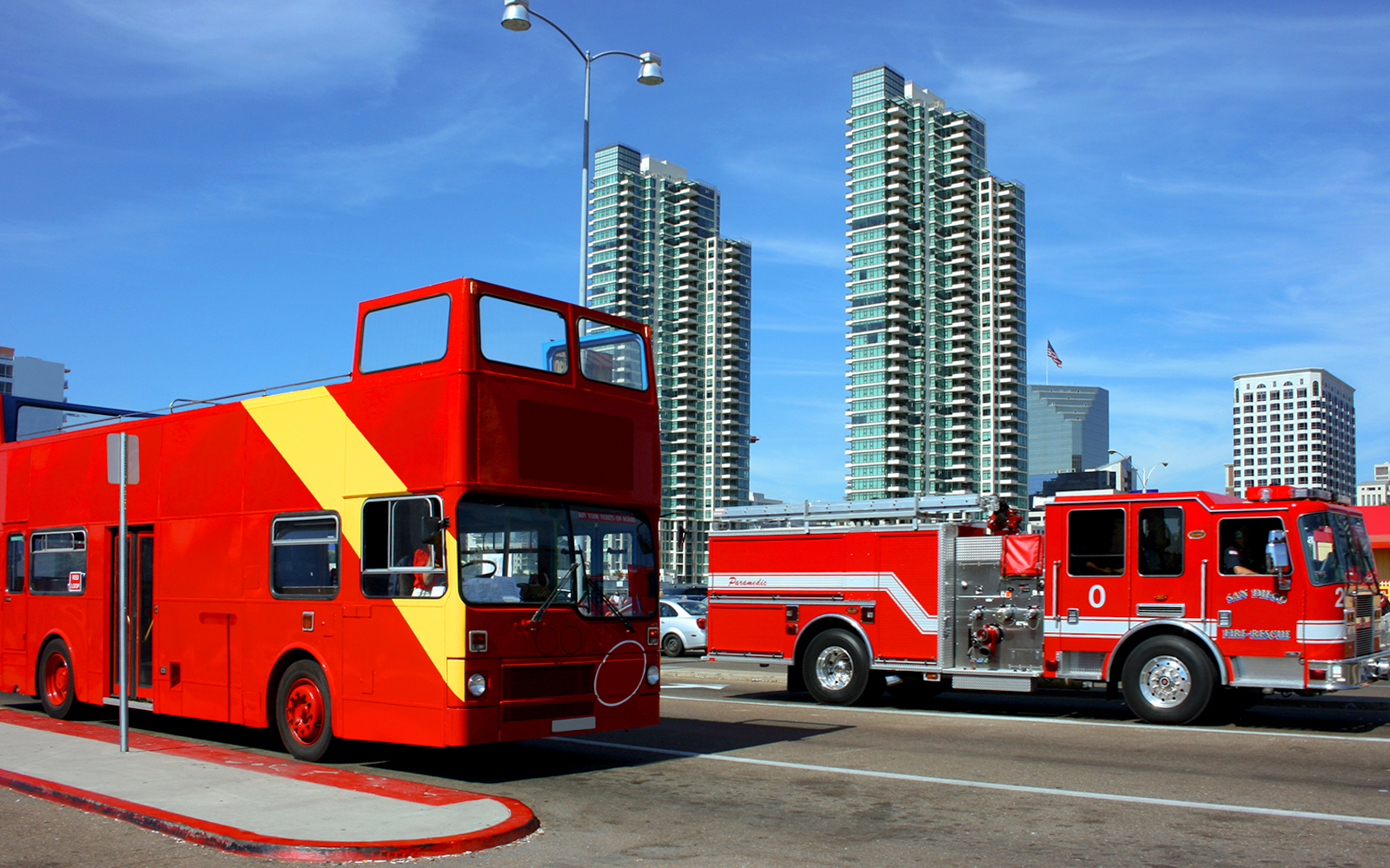 San Diego public transport bus on city street with palm trees in background