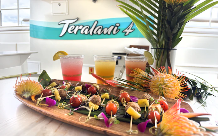 Tropical drinks and skewers on a luxury snorkel sail tour in Maui, Hawaii.