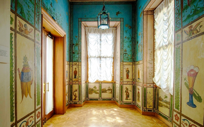 Decorative room with painted walls inside Lobkowicz Palace Museum, Prague Castle, Prague.