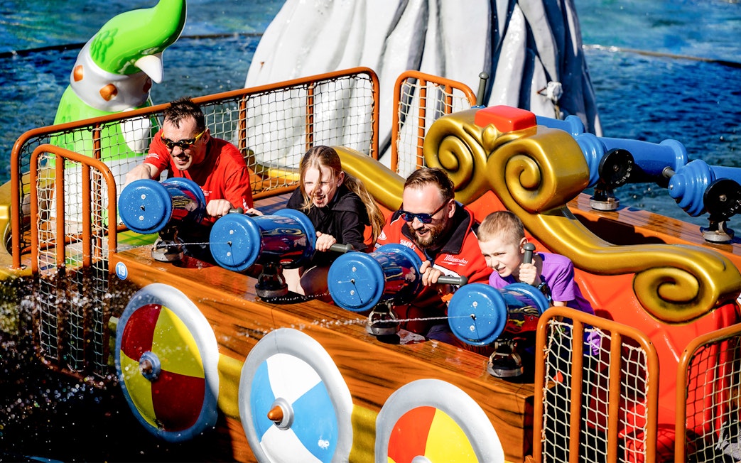 Visitors enjoying a water ride at Poland's largest open-air water park in Energylandia, Zator.