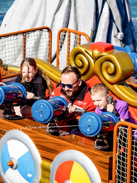 Visitors enjoying a water ride at Poland's largest open-air water park in Energylandia, Zator.