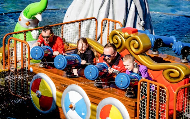 Visitors enjoying a water ride at Poland's largest open-air water park in Energylandia, Zator.