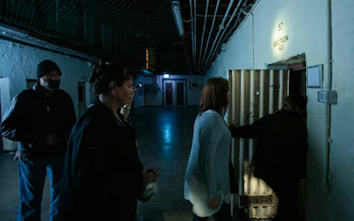 Visitors entering a prison cell at Fremantle Prison, Section 43.