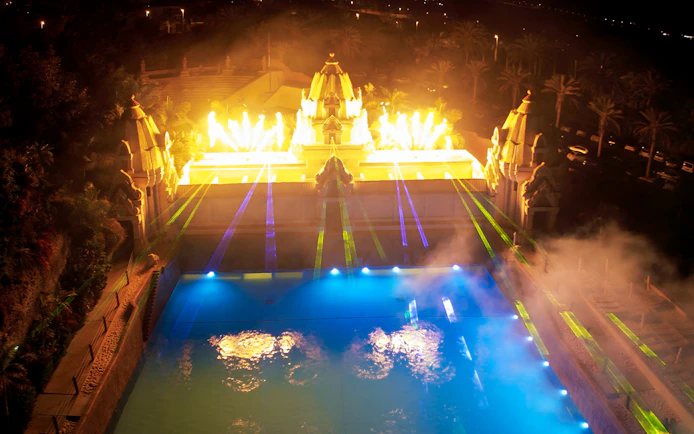 Siam Park night show with lights and water display.