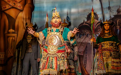 Performer in ornate costume during Phantom of the Opera production.