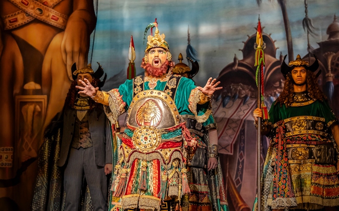 Performer in ornate costume during Phantom of the Opera production.