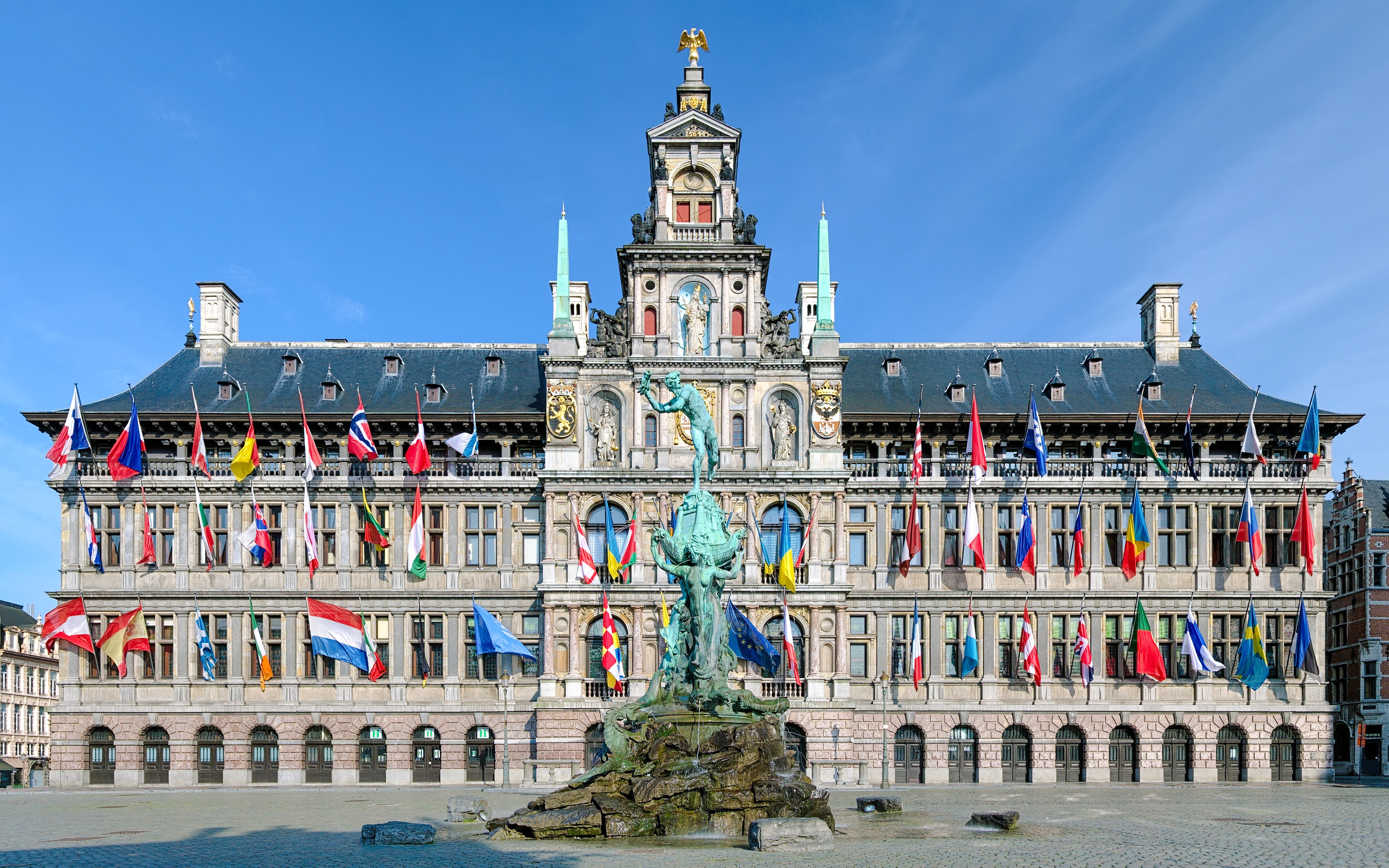 Antwerp City Hall with Brabo Fountain in front, Belgium.