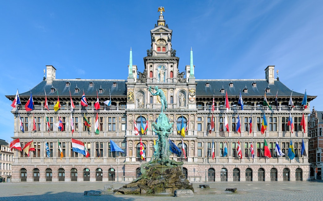 Antwerp City Hall with Brabo Fountain in front, Belgium.