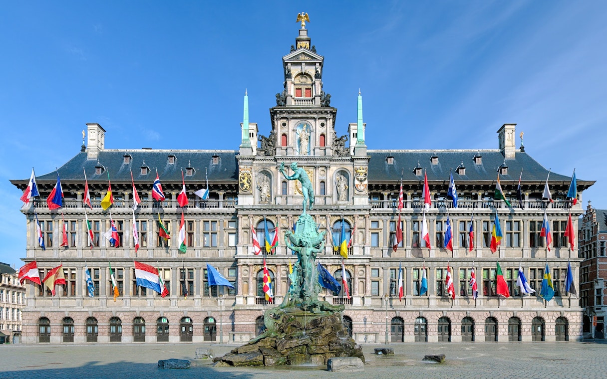 Antwerp City Hall with Brabo Fountain in front, Belgium.