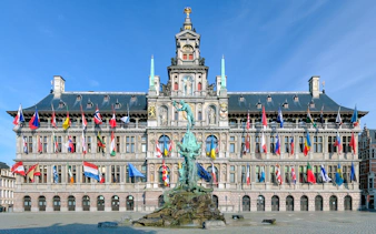 Antwerp City Hall with Brabo Fountain in front, Belgium.