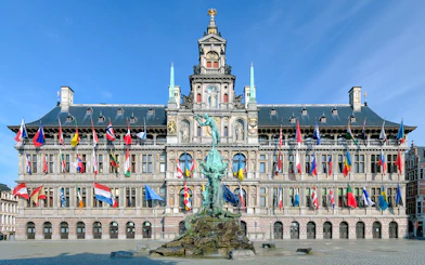 Antwerp City Hall with Brabo Fountain in front, Belgium.
