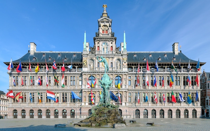 Antwerp City Hall with Brabo Fountain in front, Belgium.