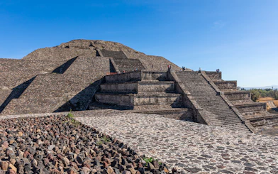People climbing the Pyramid of the Moon in Teotihuacan, Mexico.