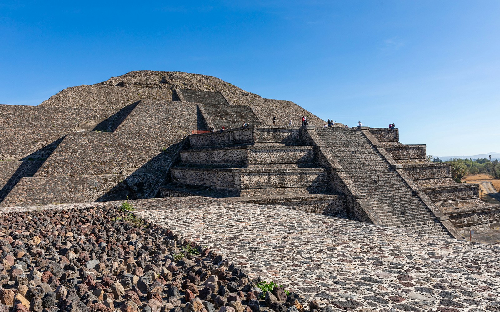 Visitors ascending the Pyramid of the Moon at Teotihuacan, Mexico.