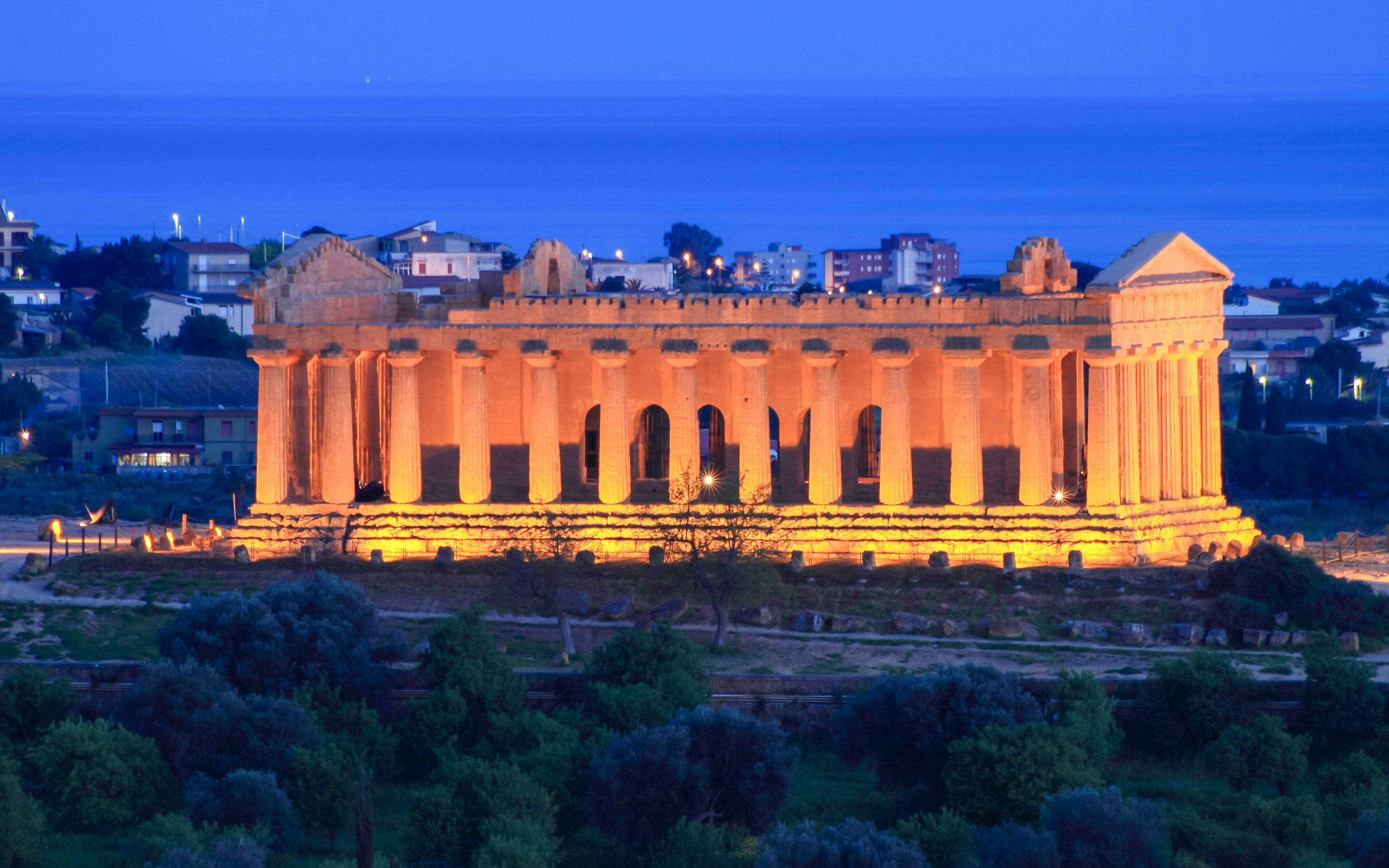 Valley of Temples illuminated at night in Agrigento, Sicily.
