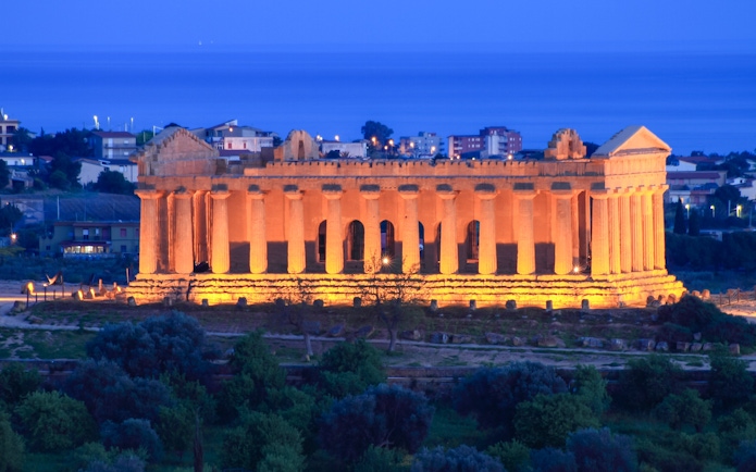 Valley of Temples illuminated at night in Agrigento, Sicily.