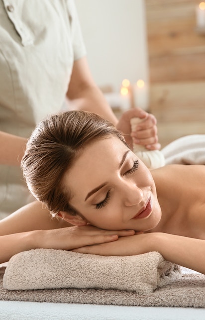 Yoga session overlooking the ocean in Bali, Indonesia.