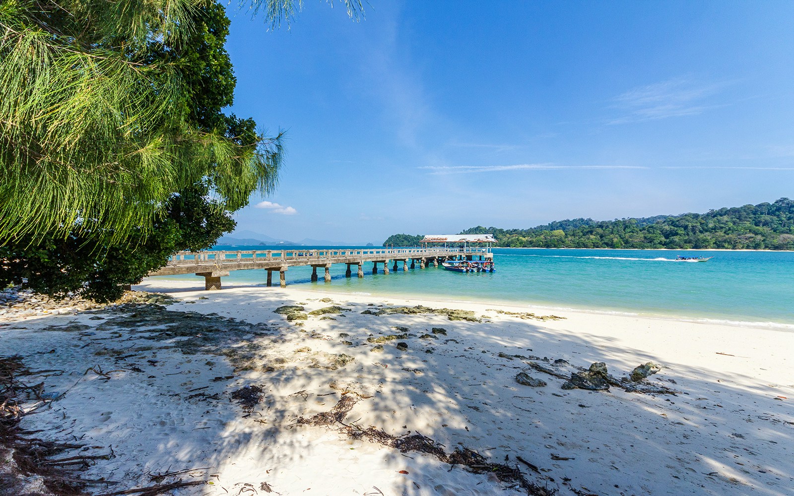 Langkawi Island Hopping Cruise with view of Beras Basah beach and surrounding turquoise waters.