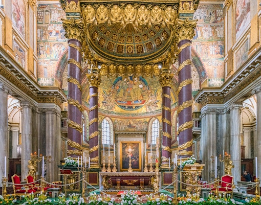Santa Maria Maggiore's Triumphal Arch mosaics in Rome, featuring intricate religious artwork.