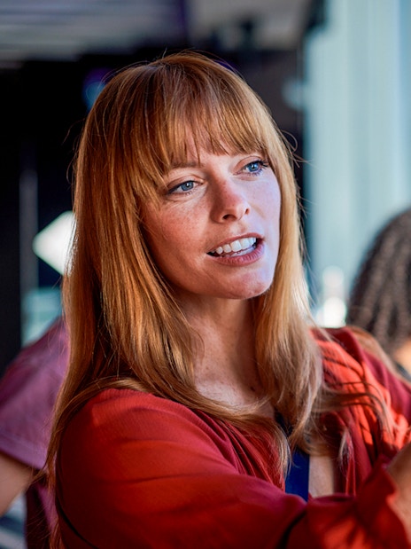 Person taking a photo at Melbourne Skydeck, Eureka Tower.