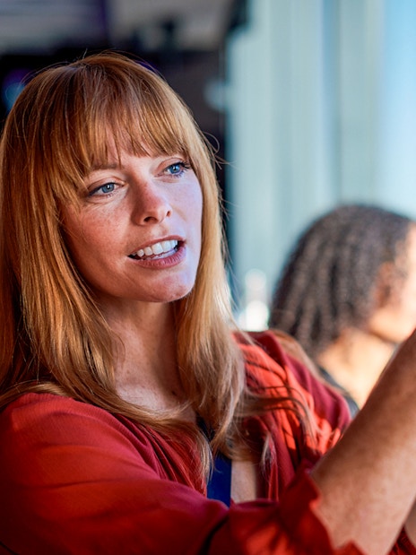Person taking a photo at Melbourne Skydeck, Eureka Tower.