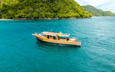 Phuket Private Longtail Boat Charter with Jacuzzi to Coral Island Banana Beach and Promthep Cape