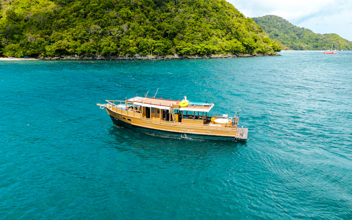 Phuket Private Longtail Boat Charter with Jacuzzi to Coral Island Banana Beach and Promthep Cape