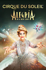 Cirque Du Soleil Alegria performers in vibrant costumes on stage, showcasing acrobatics and dance.