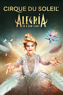 Cirque Du Soleil Alegria performers in vibrant costumes on stage, showcasing acrobatics and dance.