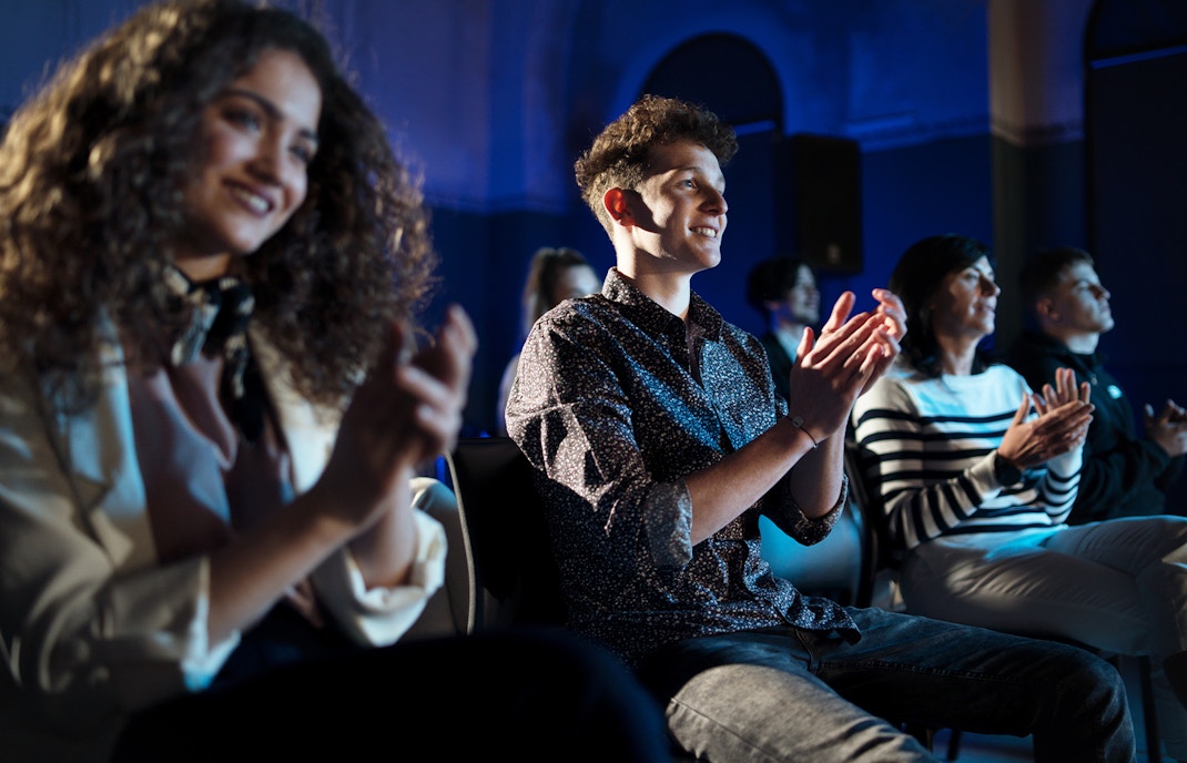 people enjoying wide curved screen experience of Honda Pacific Visions Theater ar Aquarium of the pacific