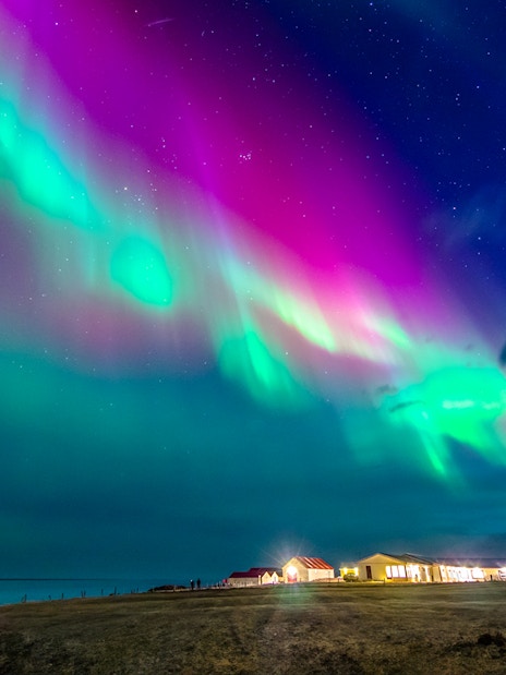 Northern Lights over a house in Rovaniemi, Finland.