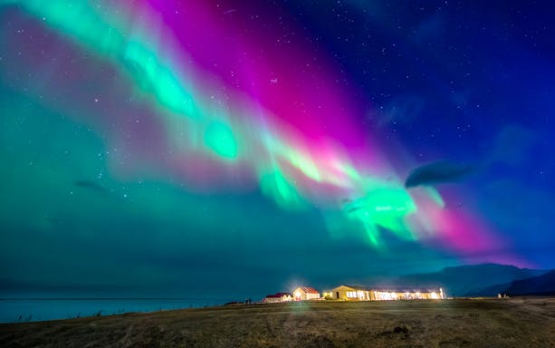 Northern Lights over a house in Rovaniemi, Finland.