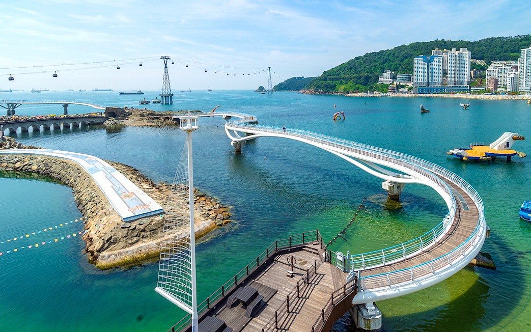 Busan Blueline Park Sky Capsule Tour with ocean view and coastal walkway.