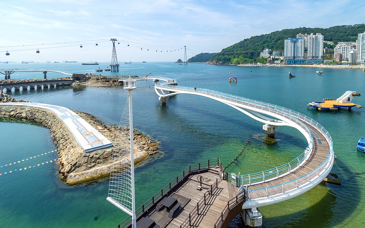 Busan Blueline Park Sky Capsule Tour with ocean view and coastal walkway.
