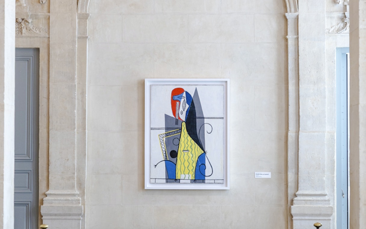Artwork displayed in Picasso Museum, Paris, featuring abstract geometric shapes.