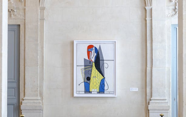 Artwork displayed in Picasso Museum, Paris, featuring abstract geometric shapes.