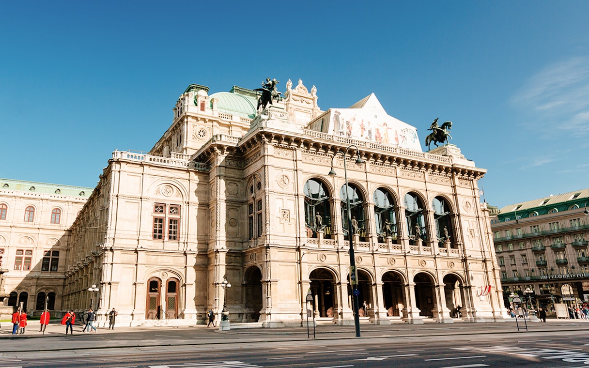 Vienna State Opera building on a sunny day during the Schönbrunn & city tour.