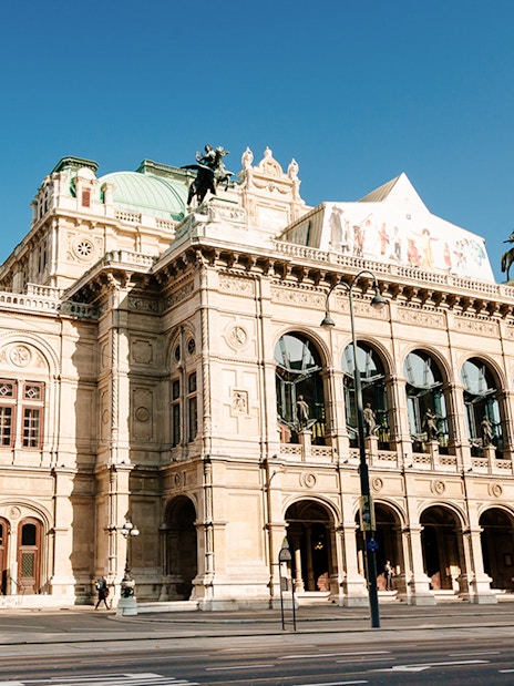 Vienna State Opera building on a sunny day during the Schönbrunn & city tour.