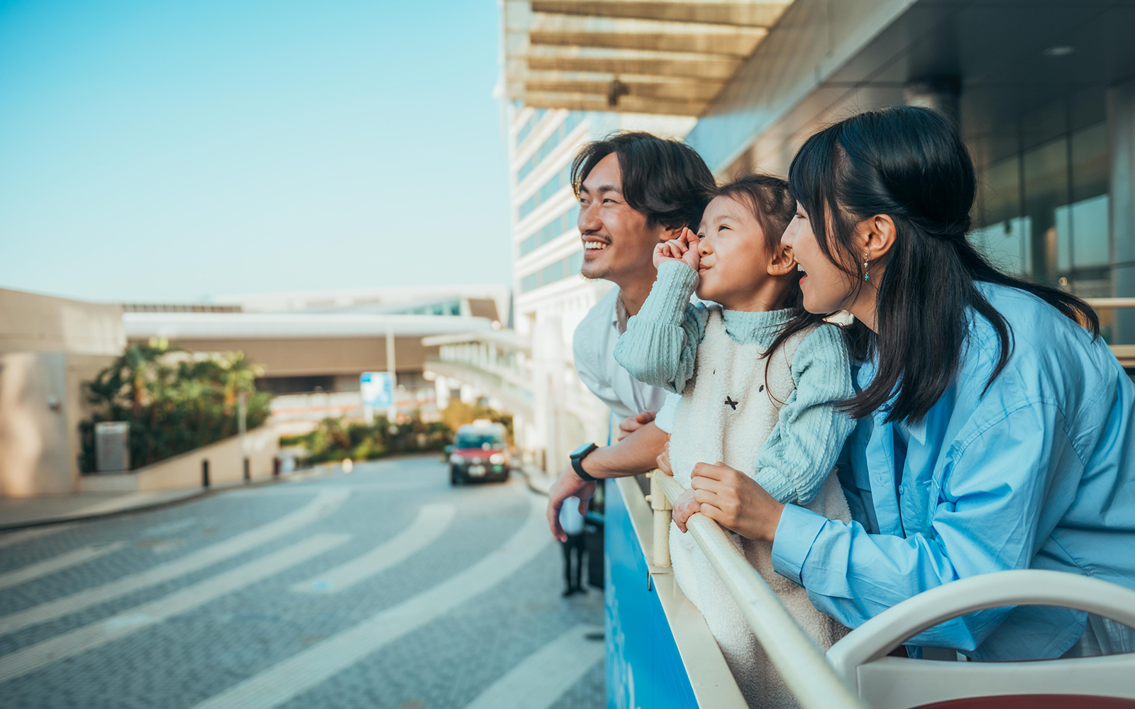 Family enjoying view from BigBus on Lantau Island Hop-On Hop-Off Tour.