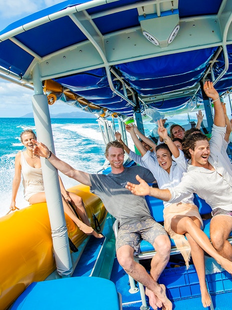 Group enjoying a boat ride on Whitsundays snorkel cruise from Airlie Beach.