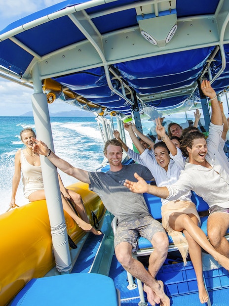 Group enjoying a boat ride on Whitsundays snorkel cruise from Airlie Beach.