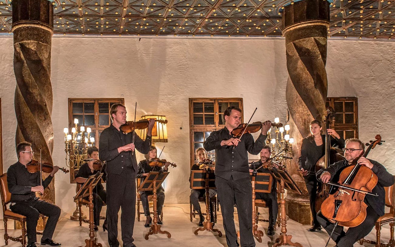 Musicians performing Mozart at Fortress Hohensalzburg concert hall in Salzburg, Austria.