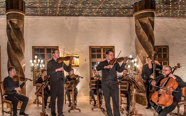 Musicians performing Mozart at Fortress Hohensalzburg concert hall in Salzburg, Austria.