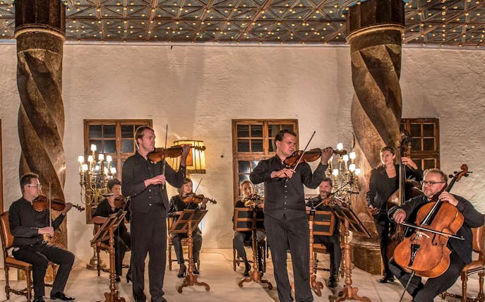 Musicians performing Mozart at Fortress Hohensalzburg concert hall in Salzburg, Austria.