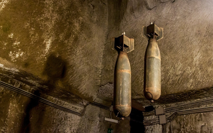 WW2 bombs displayed in Naples Underground tunnel.