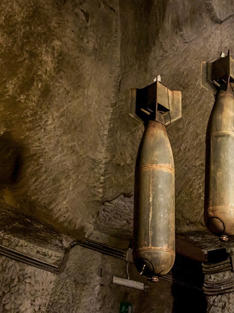 WW2 bombs displayed in Naples Underground tunnel.