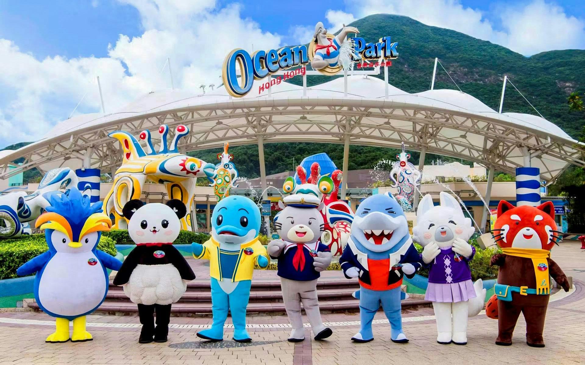 Mascot characters at Ocean Park Hong Kong greeting visitors at the entrance.