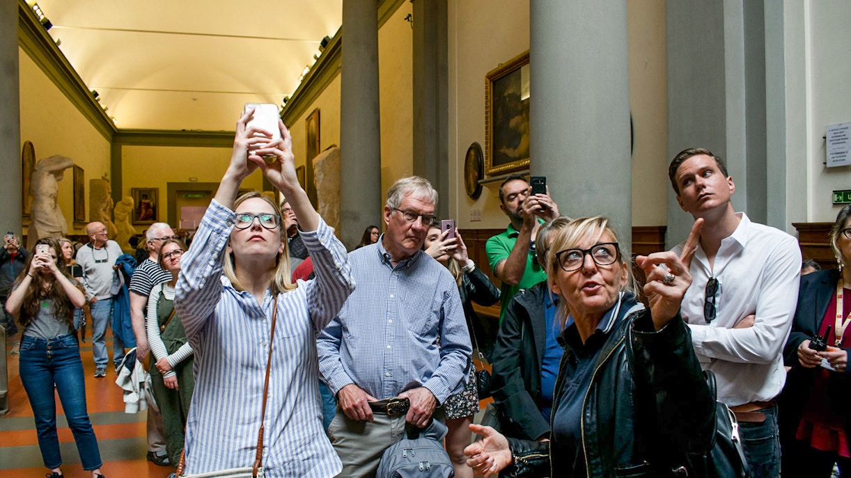 Tour guide talking to group at the Accademia Gallery